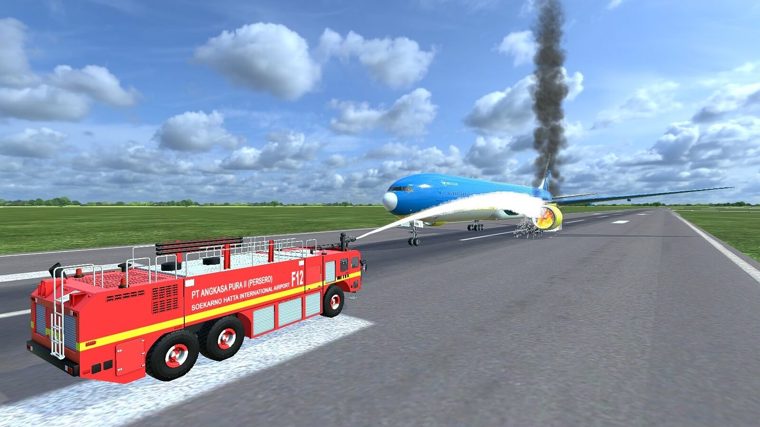 Simulasi VR ARFF: kendaraan pemadam menyemprotkan air ke badan pesawat